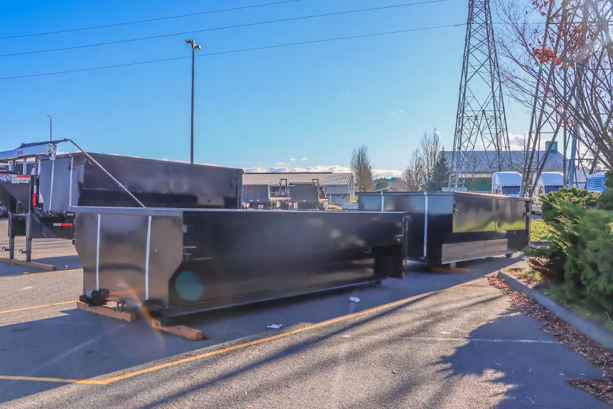 Roll-off dumpster ready for waste disposal at job site for Yard Waste Dumpster Rental in Richmond